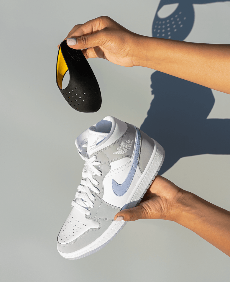 Man Holding a Sneaker with Crep Protect Sneaker Guard for Protection